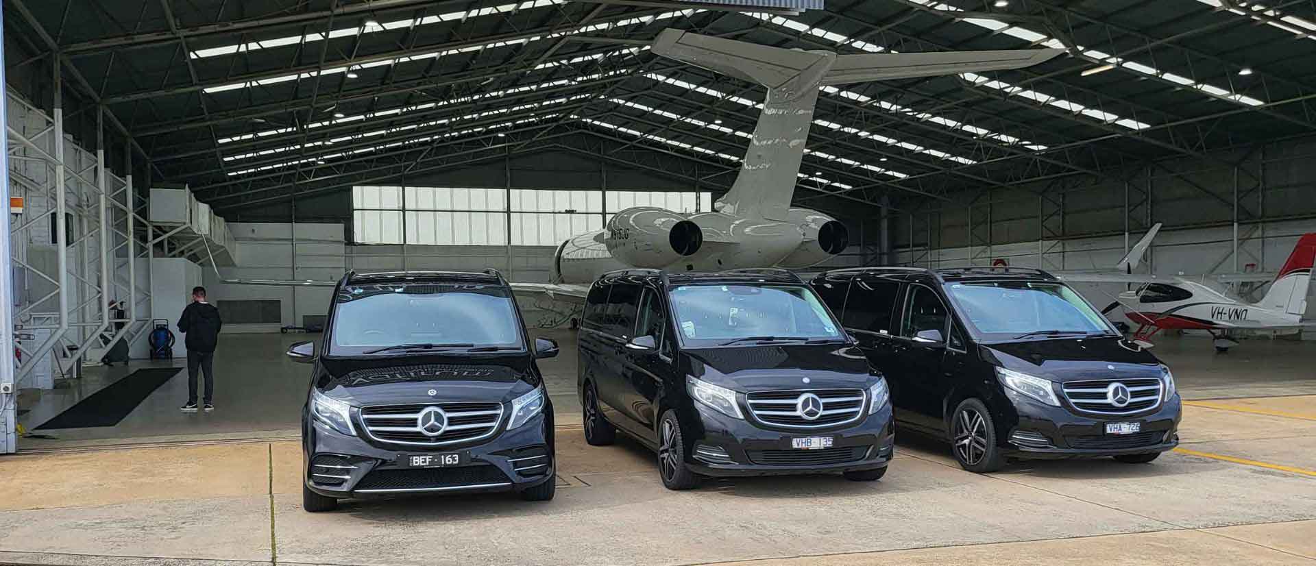 Three black chauffeur service cars at Melbourne Airport